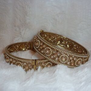 Elegant Gold and Pearl Bangles